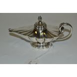 A 19th century Anglo-Indian silver lamp shaped table cigar lighter, fluted, spiral knop finial,