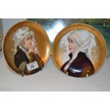 A pair of 19th century cabinet plates, decorated in gilt,