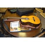 An KCC 353 classical guitar,