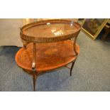 A good 19th century Sheraton Revival oval two tier etargere, inlaid overall with ribbon tied swags,