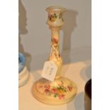 A Royal Worcester blush ivory candlestick, painted with pink,