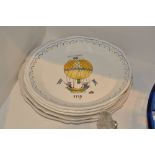 A set of three French earthenware plates,