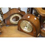 An Art Deco oak mantel clock, Arabic numerals, twin winding holes, c.