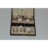 A set of six George III teaspoons, scalloped bowls, London 1804, later case,