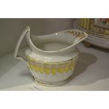 A Derby cream jug, pattern 572, gilt band on a yellow chevron ground,  angular handle, 11cm high,