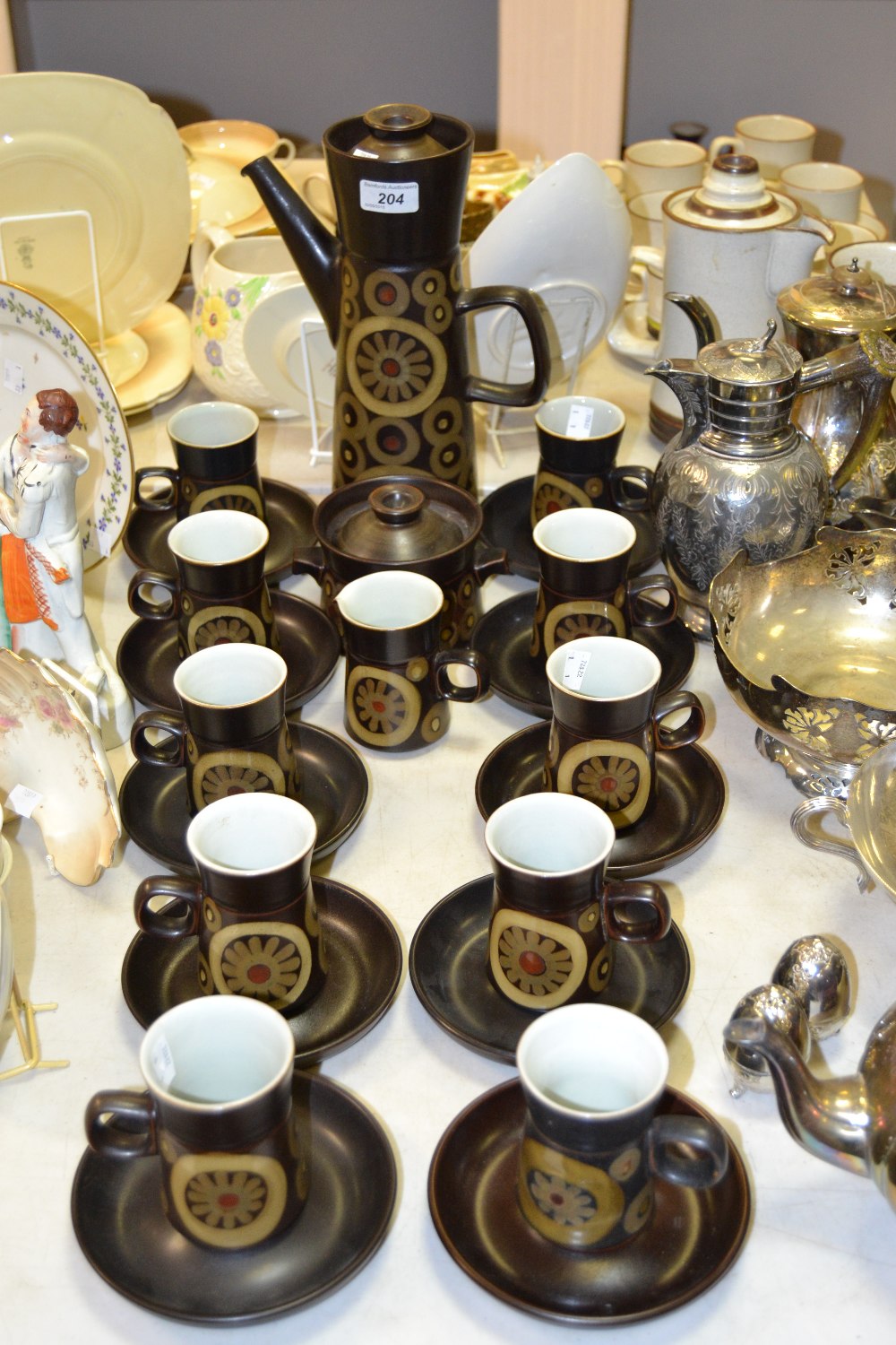 A Denby Arabesque ten setting coffee service, comprising coffee pot, cream jug, covered sugar basin,