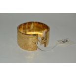 A 9ct gold plated hinge bangle