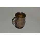 An early 20th century silver bell-shaped christening mug, of plain design, hallmarked, 84.