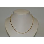 A lady's 9ct gold necklace and bracelet, 6.