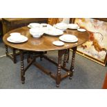 Frank Pratt of Derby - an oak oval gateleg breakfast table, turned underframe, square stretchers, c.