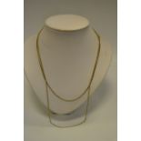 A 9ct gold belcher chain ; another 10.