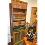 A mid 20th century pine   bookcase cabinet, with four shelves,