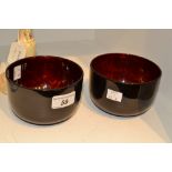 A pair of 20th century cylindrical lacquer bowls, of plain design, 11.