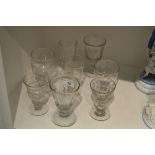 An 19th century ale glass, facet cut bowl;  a 19th century etched wine glass,