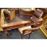 A Victorian mahogany rounded rectangular writing table, leather top,