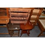 A nest of three oak tables;  a magazine rack;