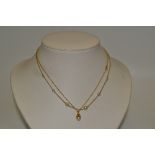 A 9ct gold and pearl necklace;  another, 5.