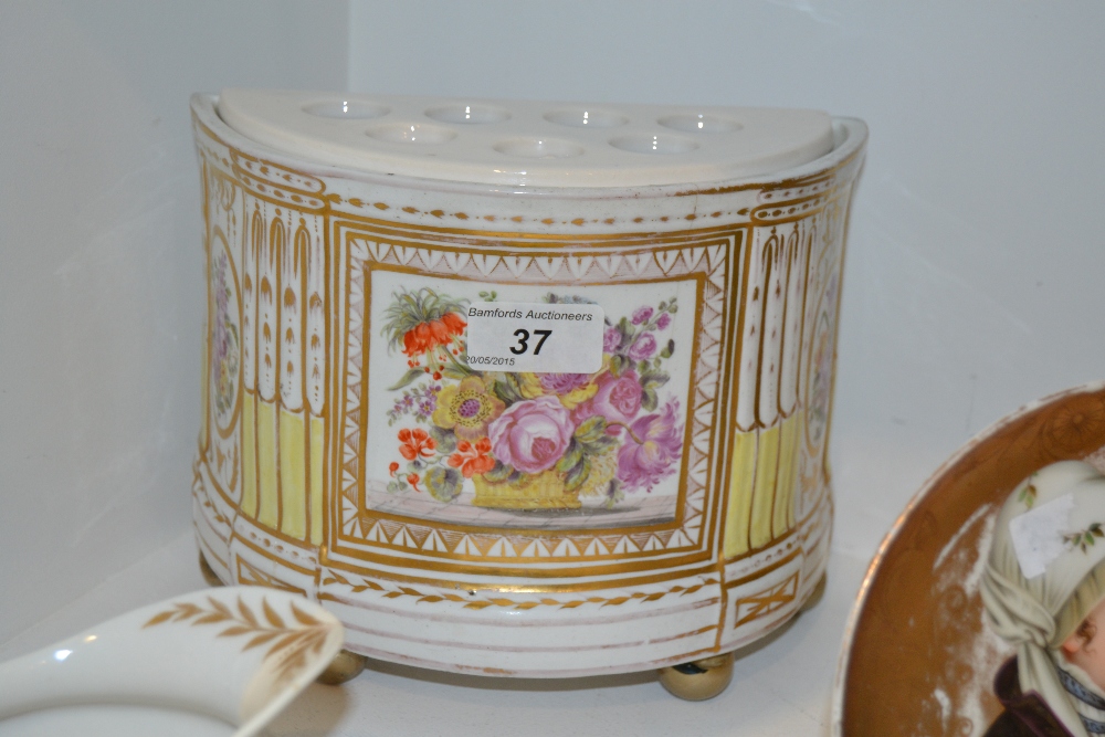 A Coalport demi-lune bough pot, painted with a gilt panel of colourful summer flowers in a basket,