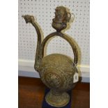 A large 19th century Chinese/Tibetan libation ewer,