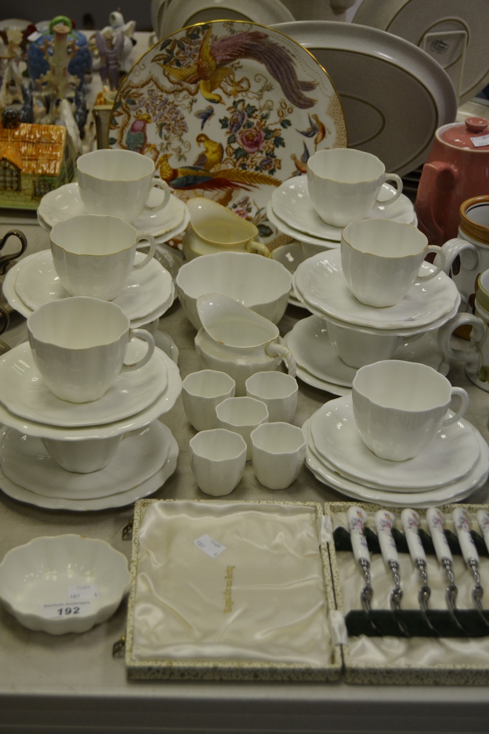 A Royal Crown Derby ten-setting tea service, of plain design, comprising teacups,