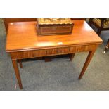 A George III mahogany rectangular tea table, folding top with moulded edge above a frieze drawer,