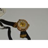 A lady's 9ct gold wristwatch, 14.