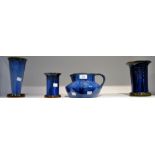 Bourne Denby Danesby Ware - a compressed jug, glazed in vibrant tones of electric blue,