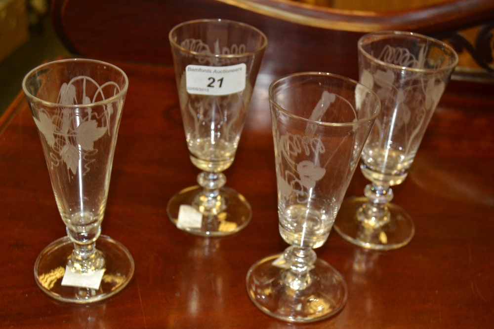 A set of four early 19th century ale glasses,