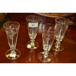 A set of four early 19th century ale glasses,