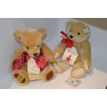 A Merrythought mohair bear, jointed, wearing a red bow, 25cm high;  another, Steiff, ltd.