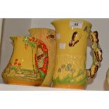A Burleigh Ware slender water jug, decorated in relief as a honeycomb with bees,