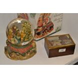 Musical Boxes;  a Kirkland Signature Musical Waterglobe with Revolving Base,