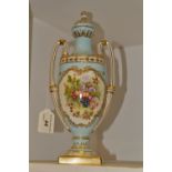 A Coalport two handled vase, painted with fruit and flowers, the verso with fowl,