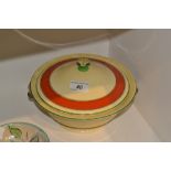 A Mintons ovoid tureen and cover, two scroll handles, banded in orange,
