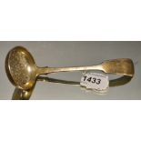 A Victorian silver fiddle pattern sugar ladle,