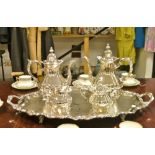A Wallace four piece plated tea service on twin handled shaped tray