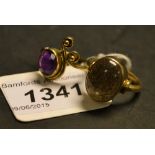 Jewellery - a sapphire cabochon ring, single black/grey oval stone,
