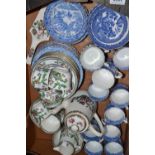 Table China- a matched Willow pattern blue and white table service including cups, saucers,