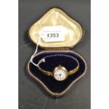 A 9ct gold lady's wristwatch, circular dial, 48330, 15 jewel,