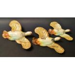 A set of three Beswick flying pink leg partridges wall plaques (1188)