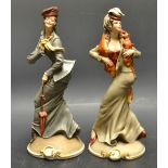 A pair of Capodimonte porcelain painted figures, Girls with Fox Fur Stole, windswept,