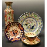 A 19th century Derby Imari palette teacup,saucer and tea plate,