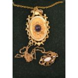 An amethyst and faux pearl pendant necklace,