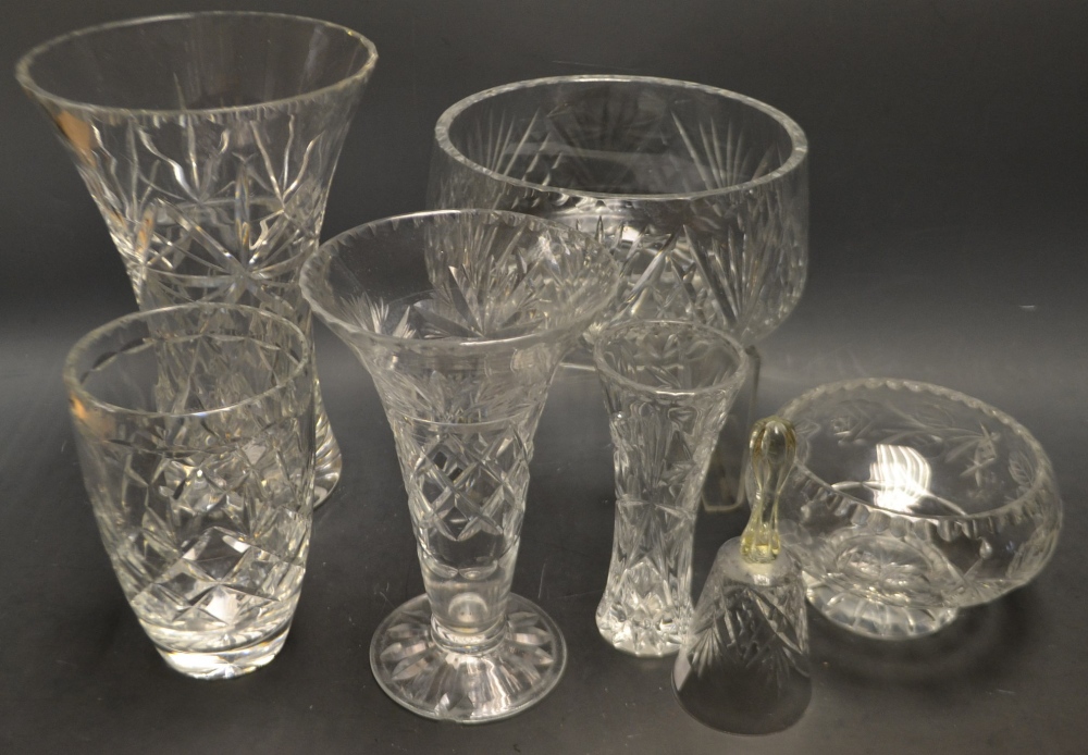A large cut glass vase; other vases and bowls;