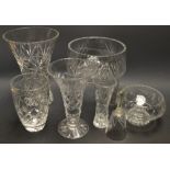A large cut glass vase; other vases and bowls;