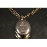 A Victorian silver locket, engraved with Kate Greenaway girl, Birmingham 1876,