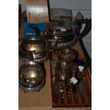A 19th century EPNS three piece boat shaped tea service; a James Dixon & Sons embossed EPNS mug;