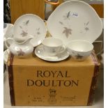 A Royal Doulton Tumbling Leaves pattern tea set for six,