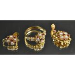 Jewellery - a seed pearl and ruby suite comprising circular shield boss cluster ring,