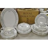 A Royal Doulton Tara Pattern dinner service for six including twin handle tureen and cover,